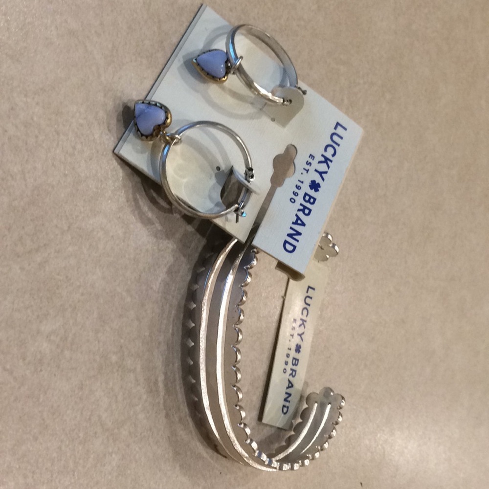 Lucky bracelet and hoop heart earrings.